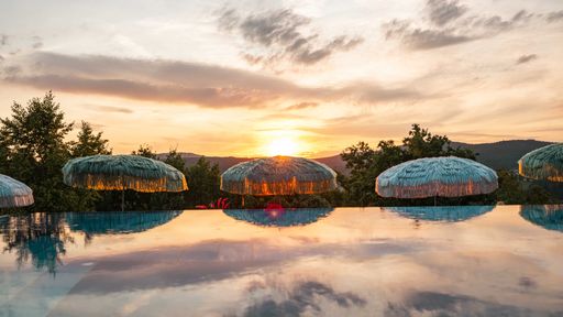 Sonnenaufgang am Dachpool