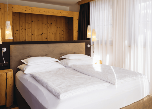 Biohotel Gran Foda Comfort Panorama Zimmer (1/4) - Alpine Hotel Gran Fodà